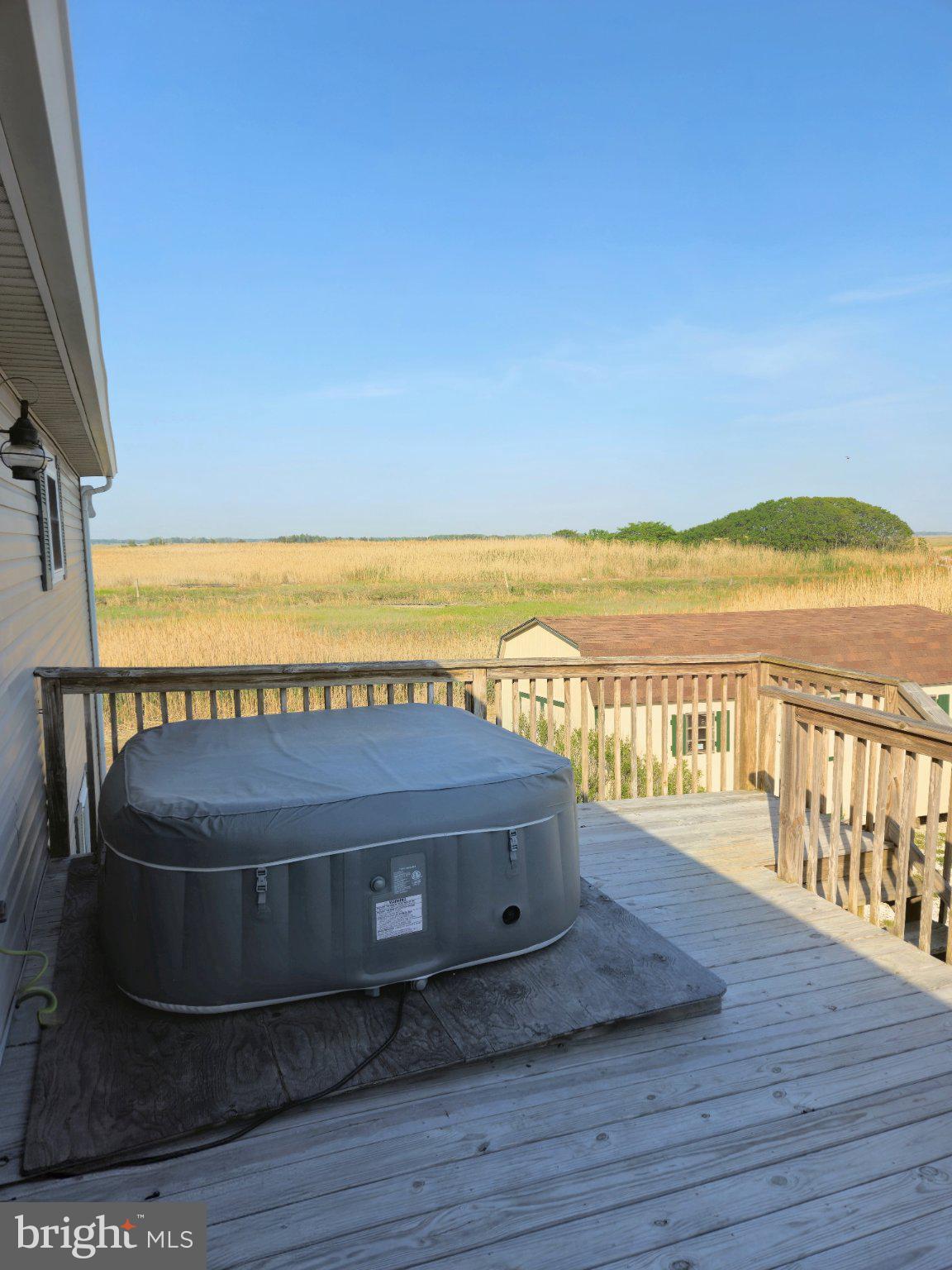 167 Cove Road Newport, NJ 08345 - Photo 11 of 38 a view of ocean from a balcony