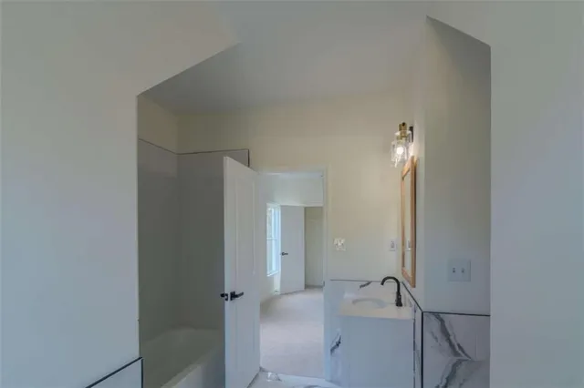 a bathroom with a bathtub