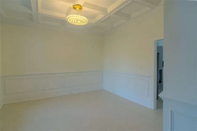 a kitchen with stainless steel appliances granite countertop a sink and a refrigerator
