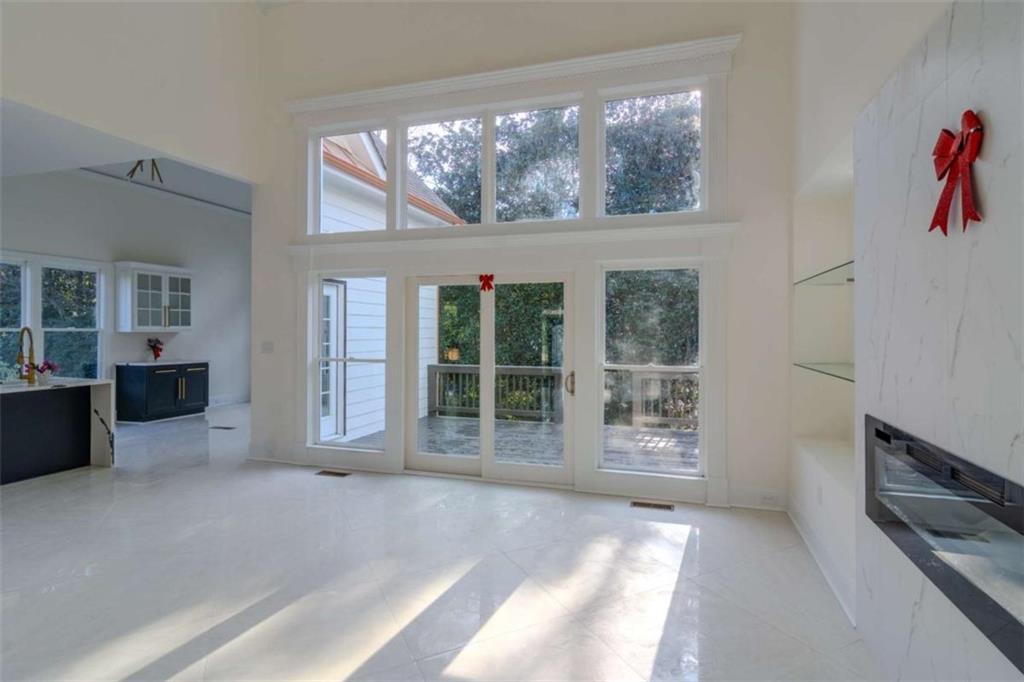4822 Chamblee Dunwoody Road Atlanta, GA 30338 - Photo 24 of 65 a view of a big room with windows and entryway
