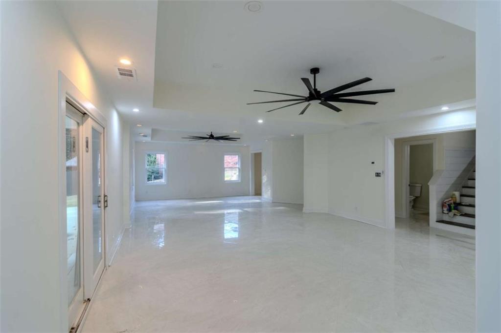 4822 Chamblee Dunwoody Road Atlanta, GA 30338 - Photo 30 of 65 a view of a livingroom with a ceiling fan and window