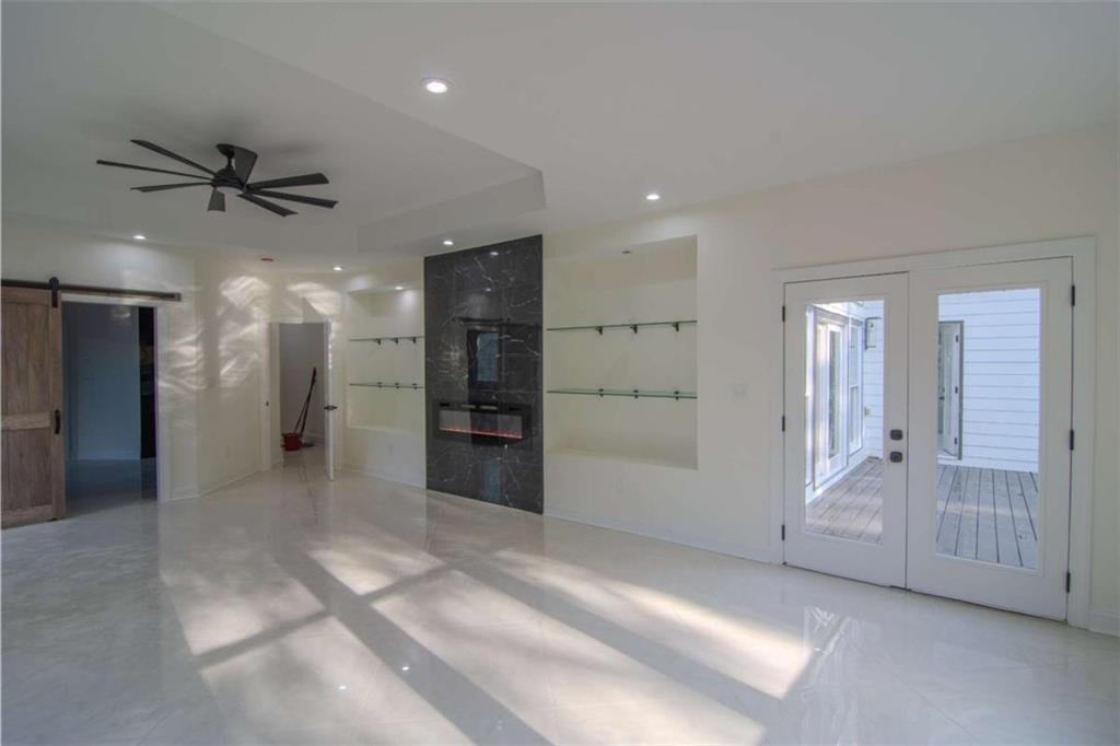 4822 Chamblee Dunwoody Road Atlanta, GA 30338 - Photo 37 of 65 a view of a hallway with closet and entryway