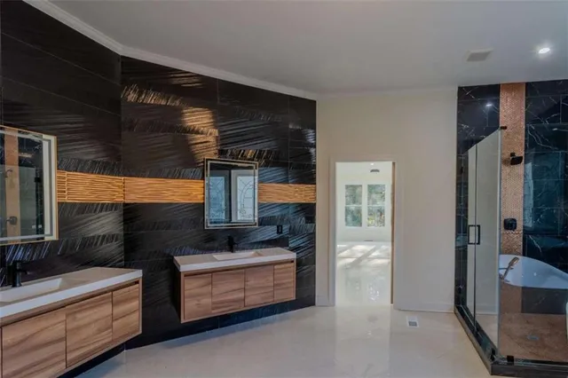 a bathroom with bathtub and window
