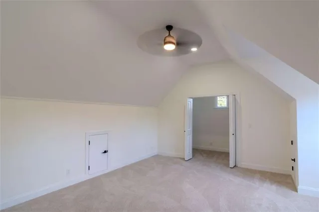 a bathroom with a granite countertop toilet a sink and bathtub