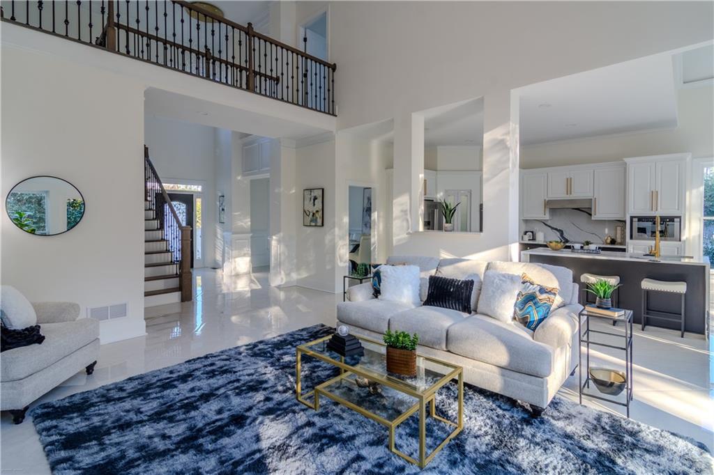 4822 Chamblee Dunwoody Road Atlanta, GA 30338 - Photo 54 of 65 a living room with furniture and wooden floor