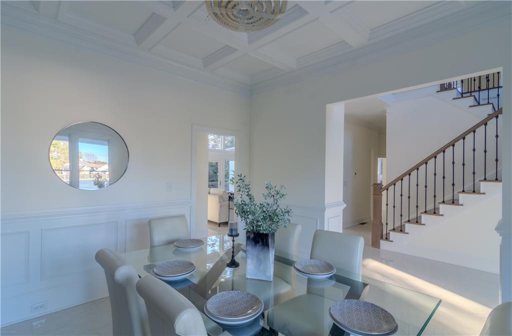 4822 Chamblee Dunwoody Road Atlanta, GA 30338 - Photo 64 of 65 a dining room with furniture potted plants and wooden floor