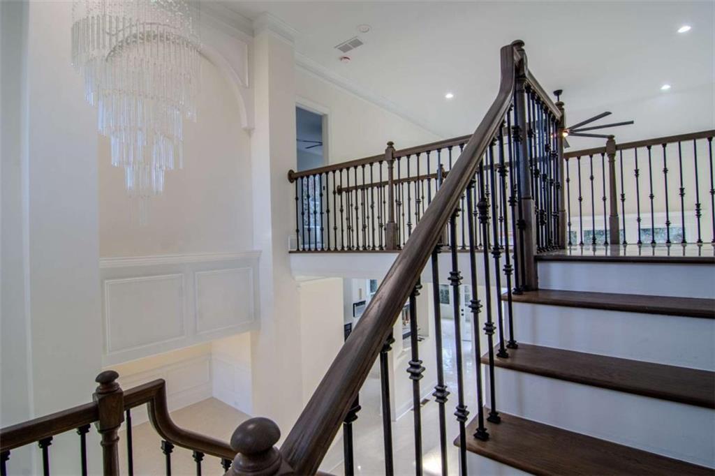 4822 Chamblee Dunwoody Road Atlanta, GA 30338 - Photo 7 of 65 a view of entryway with wooden floor and stairs