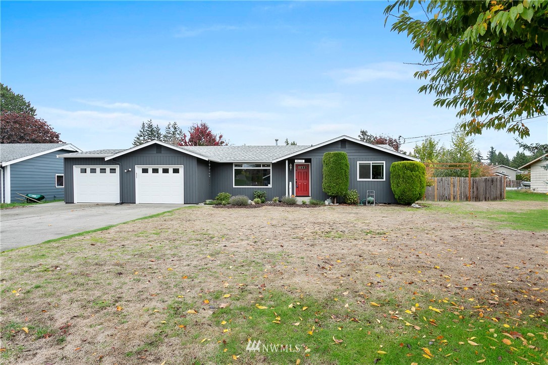 8620 Bender Road Lynden, WA 98264 - Photo 2 of 37 a view of a house with a yard