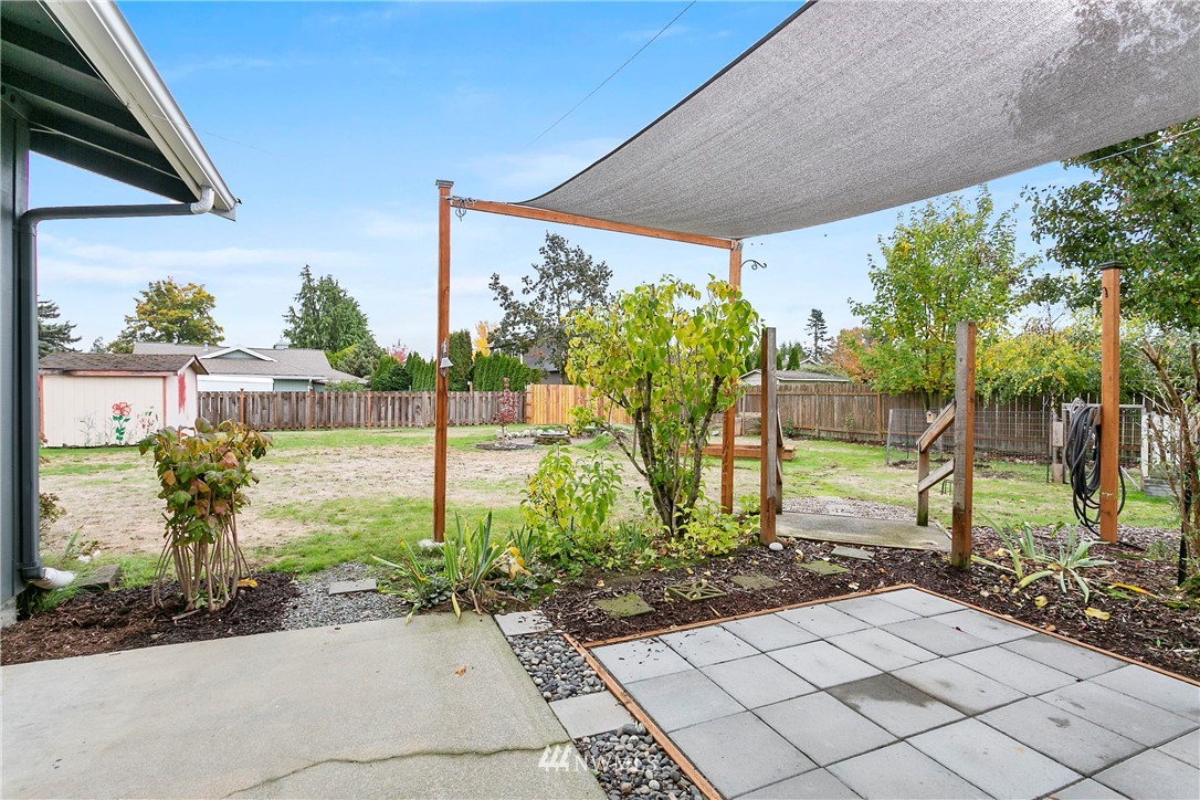8620 Bender Road Lynden, WA 98264 - Photo 21 of 37 a view of a backyard with garden