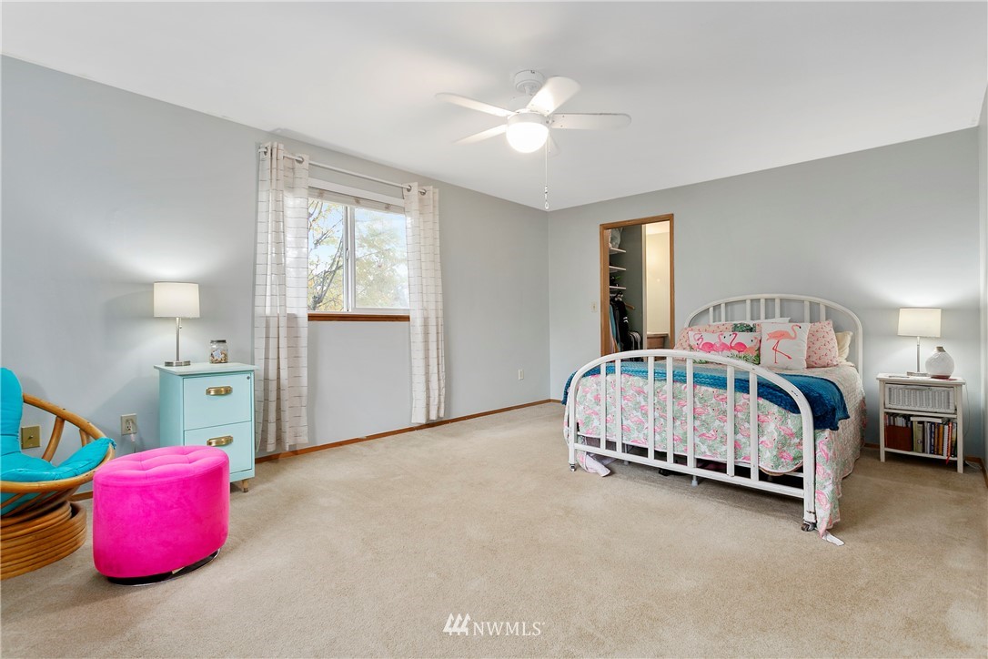 8620 Bender Road Lynden, WA 98264 - Photo 29 of 37 a bedroom with a bed and a couch