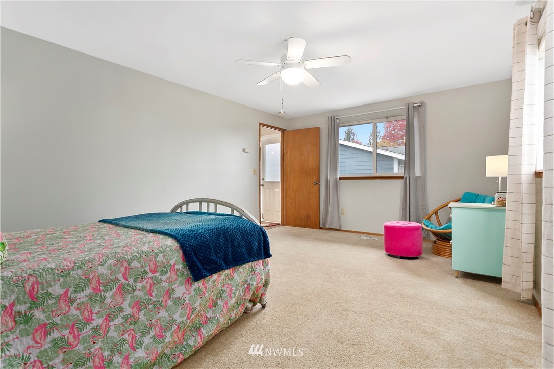 8620 Bender Road Lynden, WA 98264 - Photo 30 of 37 a bedroom with a bed and window