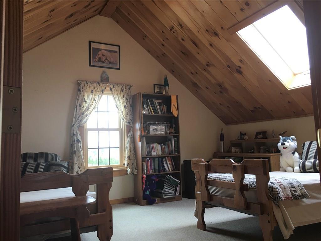 570 Monroe Road Winterport, ME 04496 - Photo 18 of 33 Upstairs bedroom with skylight and...