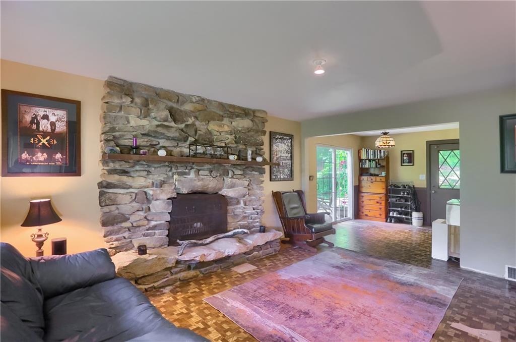 149 Seneca School Road Harmony, PA 16037 - Photo 28 of 50 This custom built stone fireplace is the focal point of this room. Large and absolutely gorgeous.