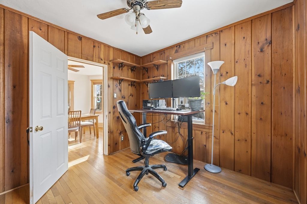 21 High Street Pepperell, MA 01463 - Photo 15 of 40 a view of a workspace with furniture and a window
