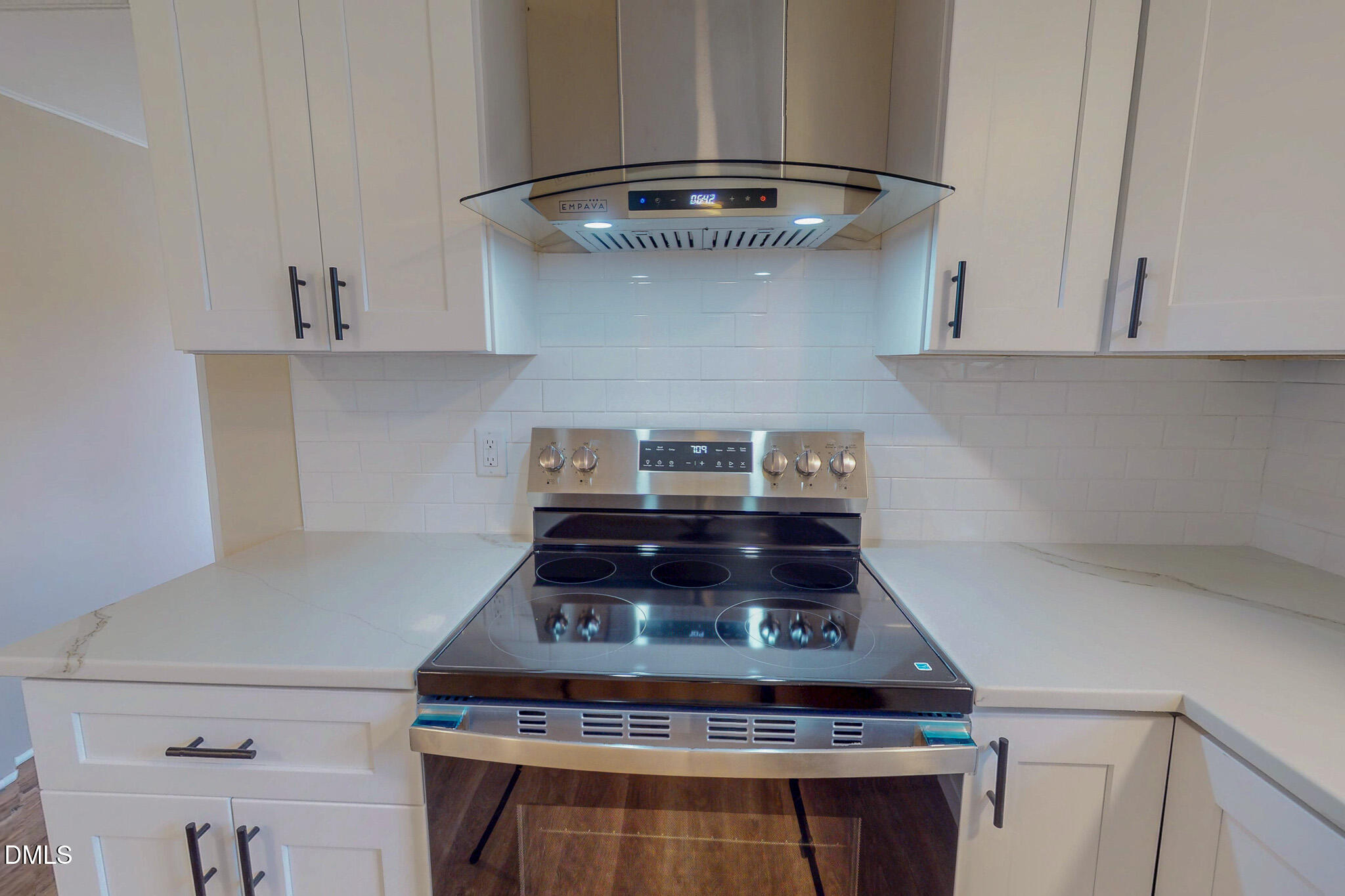 67 Halifax Road Roxboro, NC 27574 - Photo 35 of 48 a stove top oven sitting inside of a kitchen