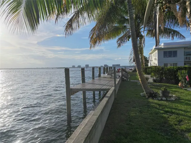 a balcony with view of outdoor space