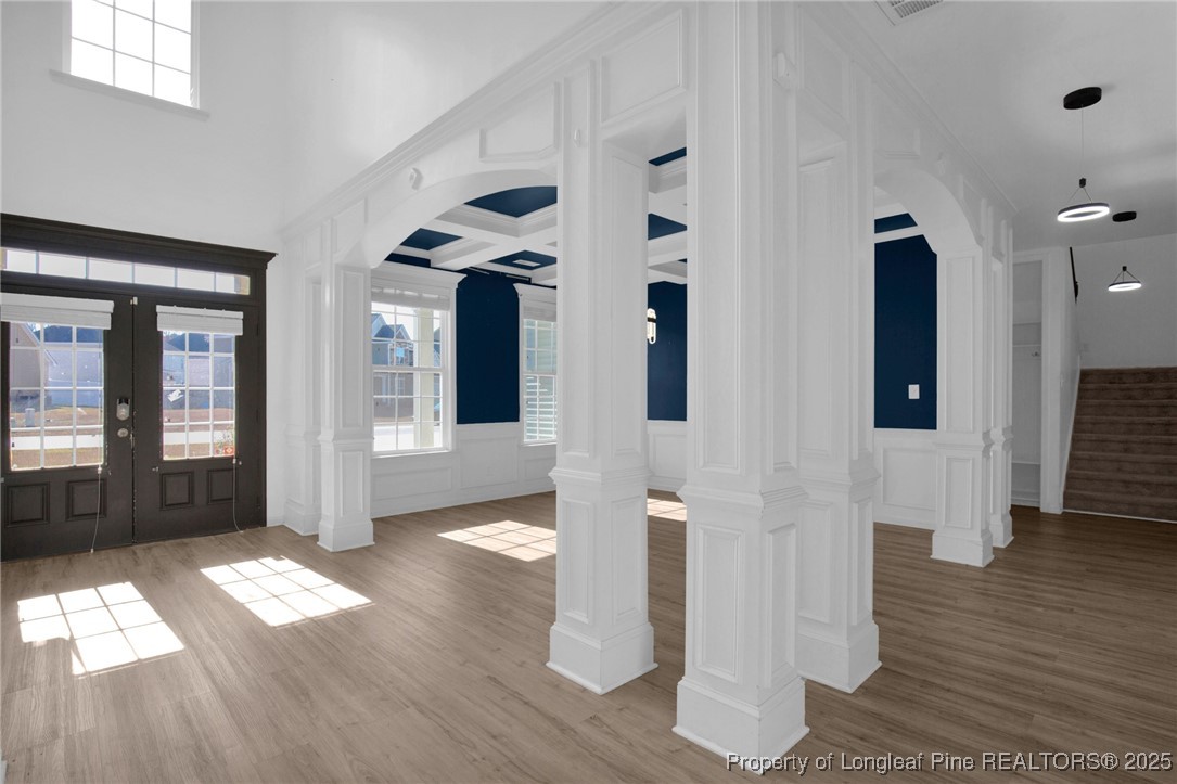 2145 Harrington Road Fayetteville, NC 28306 - Photo 6 of 50 a view of entryway with wooden floor and stairs