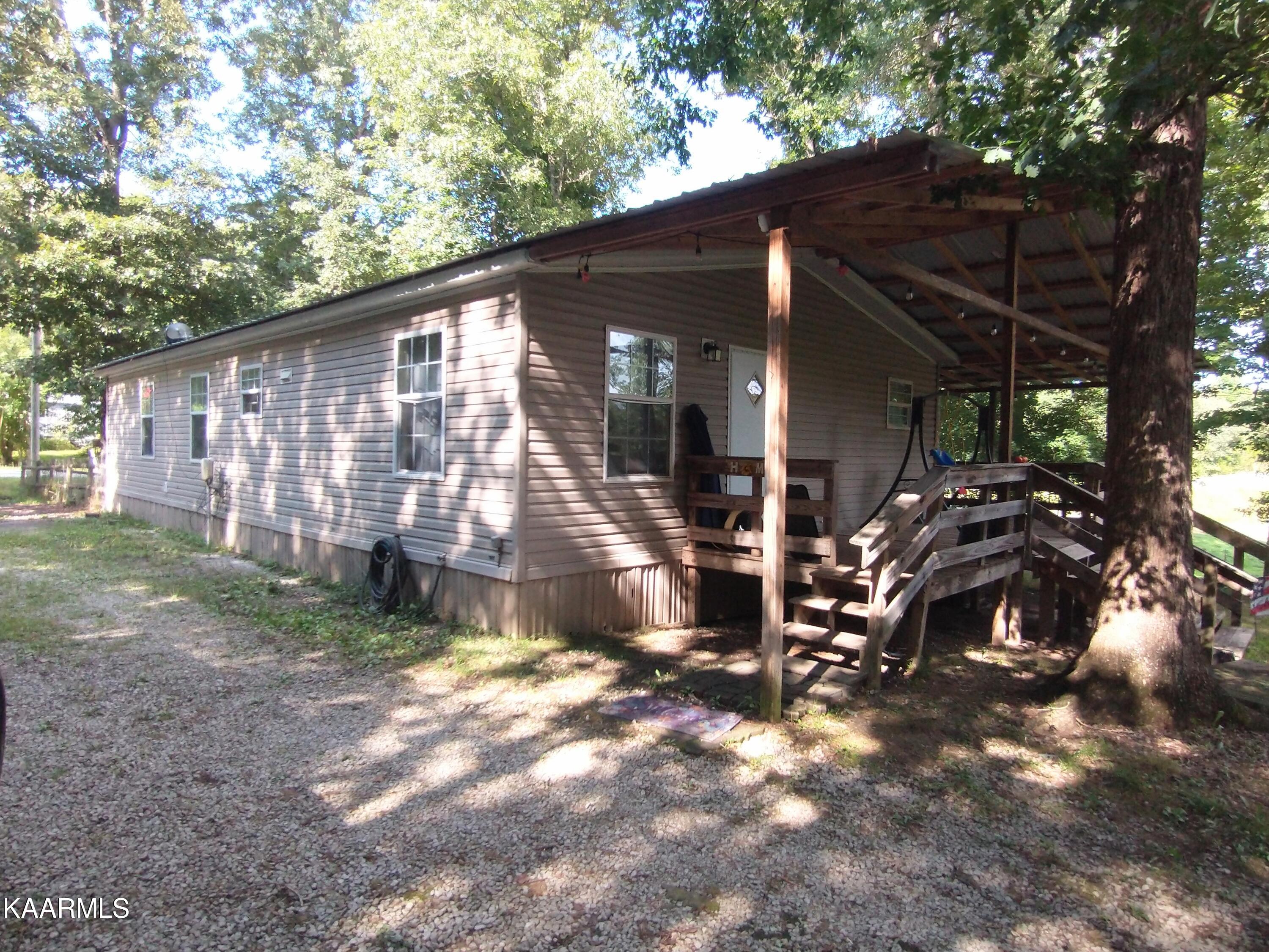 1765 Genesis Road Lancing, TN 37770 - Photo 2 of 19 IMG_20220807_160008885_2