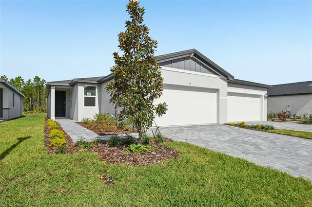 a house view with a backyard space