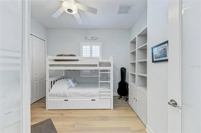 a view of a table and chairs under an umbrella in patio
