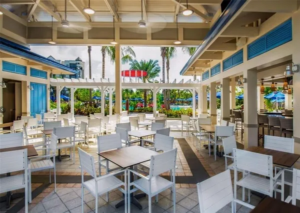 a outdoor space with lots of tables and chairs