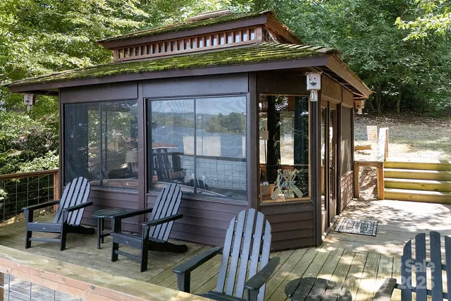 a view of a chairs and table in the patio