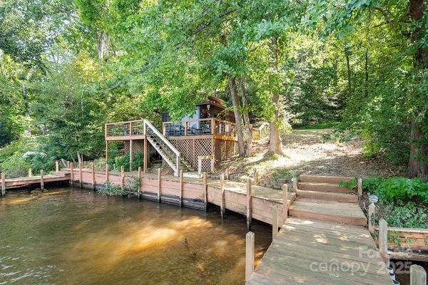 a view of swimming pool with seating area
