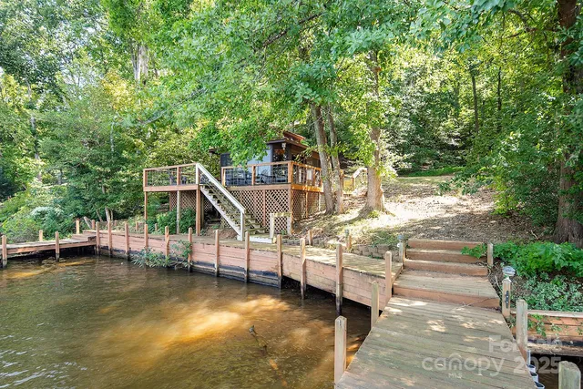 a view of swimming pool with seating area