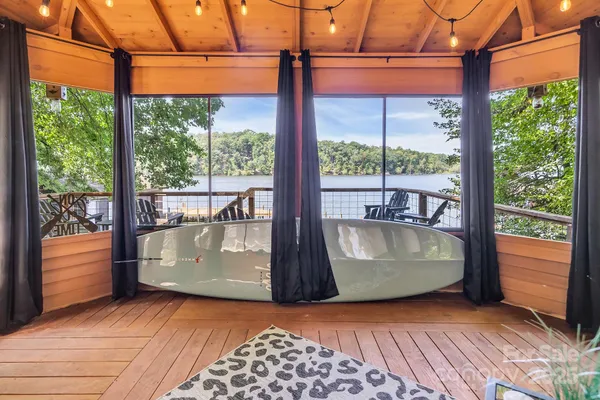 a view of wooden floor with a large window