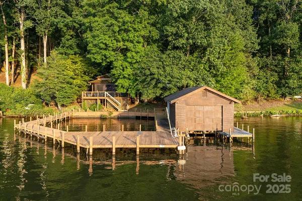 a front view of a house with a yard table and chairs