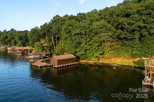 a view of a lake with sitting area