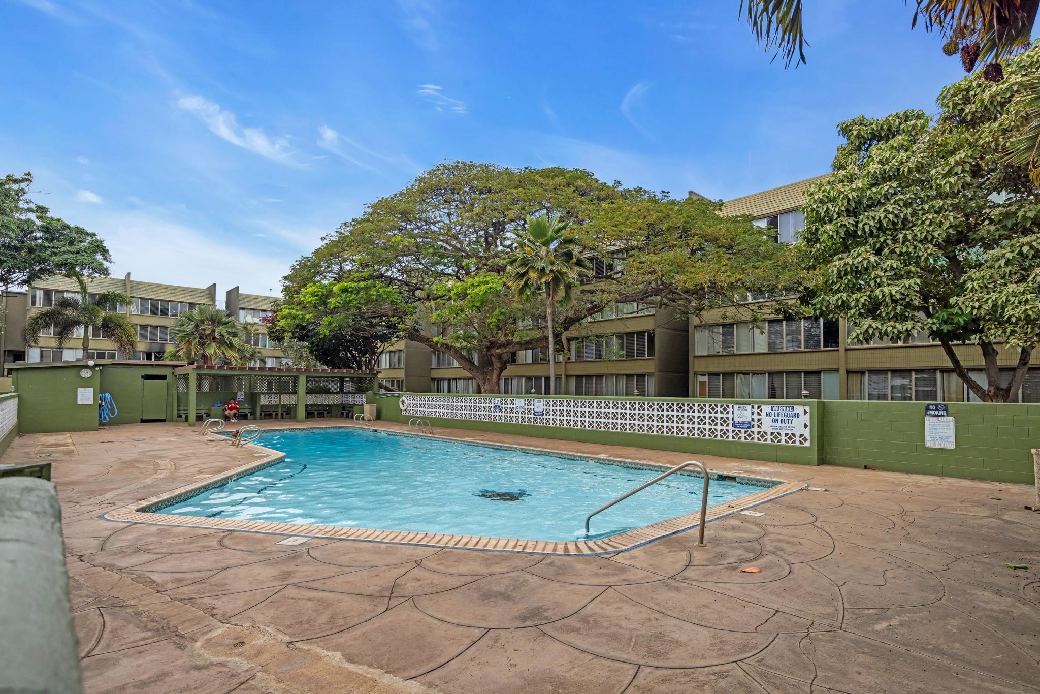 111 Kahului Beach Road, Unit D402 Kahului, HI 96732 - Photo 31 of 35 a view of swimming pool with a yard