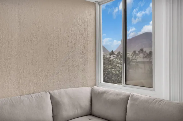 a living room with a couch and a table