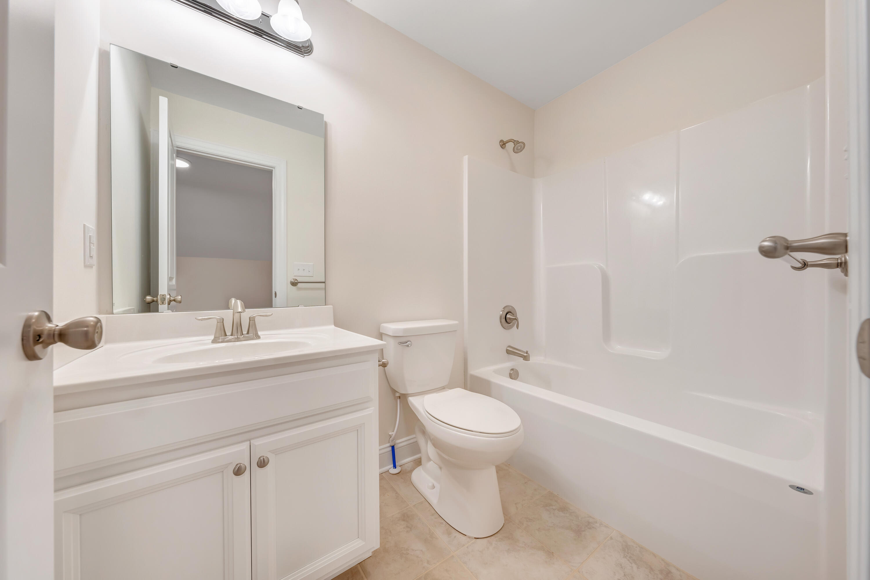 3086 Isabel Lane Salem, VA 24153 - Photo 22 of 24 a bathroom with a sink toilet vanity and tub