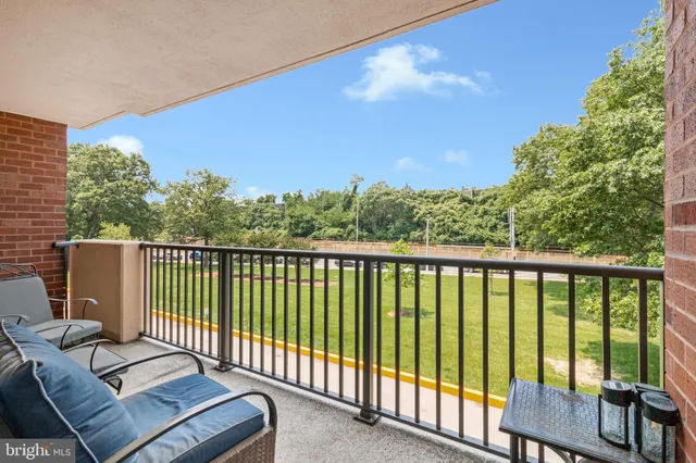 a balcony with a yard