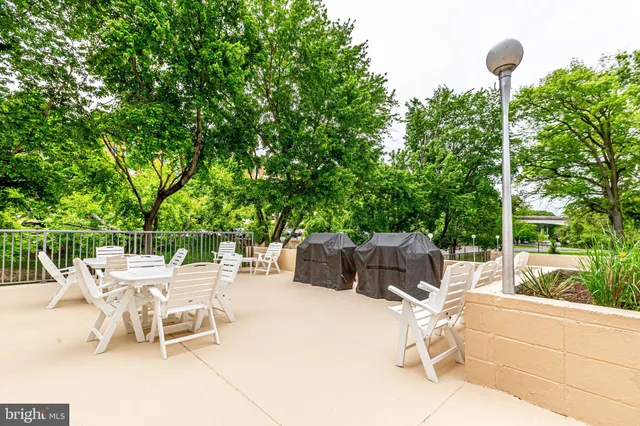 a view of swimming pool with a patio
