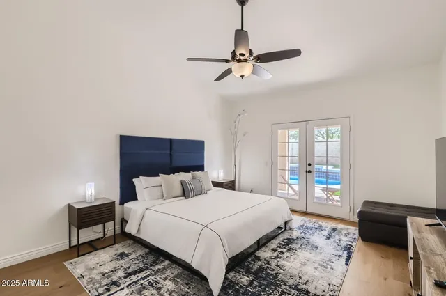 a bedroom with a bed and a couch