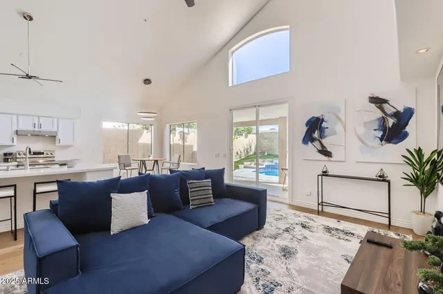 a living room with furniture or couch and a wooden floor