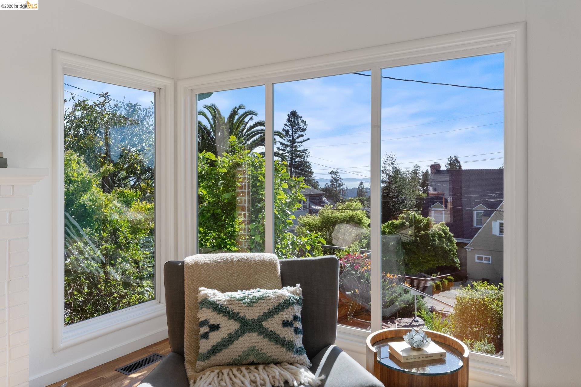 49 Windsor Avenue Kensington, CA 94708 - Photo 12 of 60 a living room with furniture and a potted plant