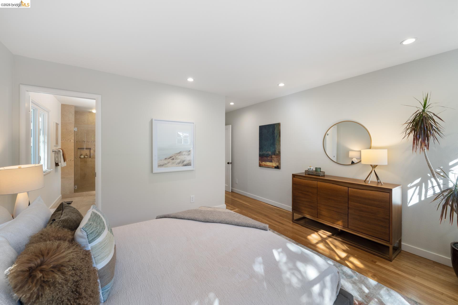 49 Windsor Avenue Kensington, CA 94708 - Photo 28 of 60 a bedroom with a bed and a chandelier