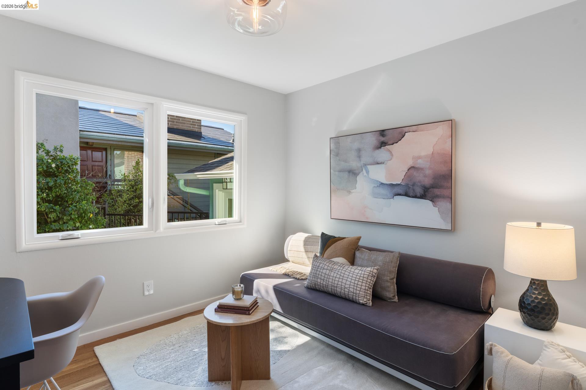 49 Windsor Avenue Kensington, CA 94708 - Photo 32 of 60 a living room with furniture and a window