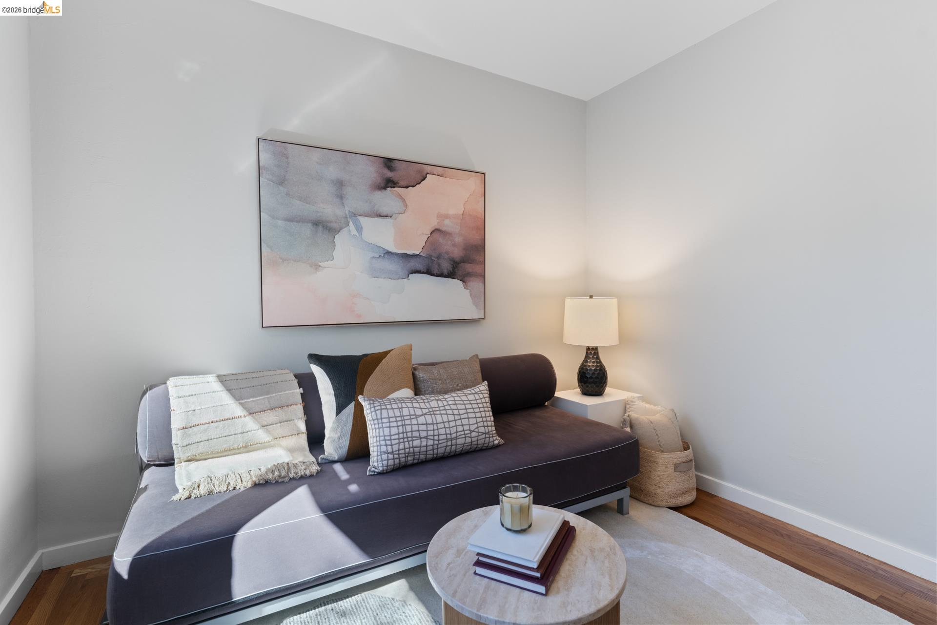 49 Windsor Avenue Kensington, CA 94708 - Photo 34 of 60 a living room with furniture and a wooden floor