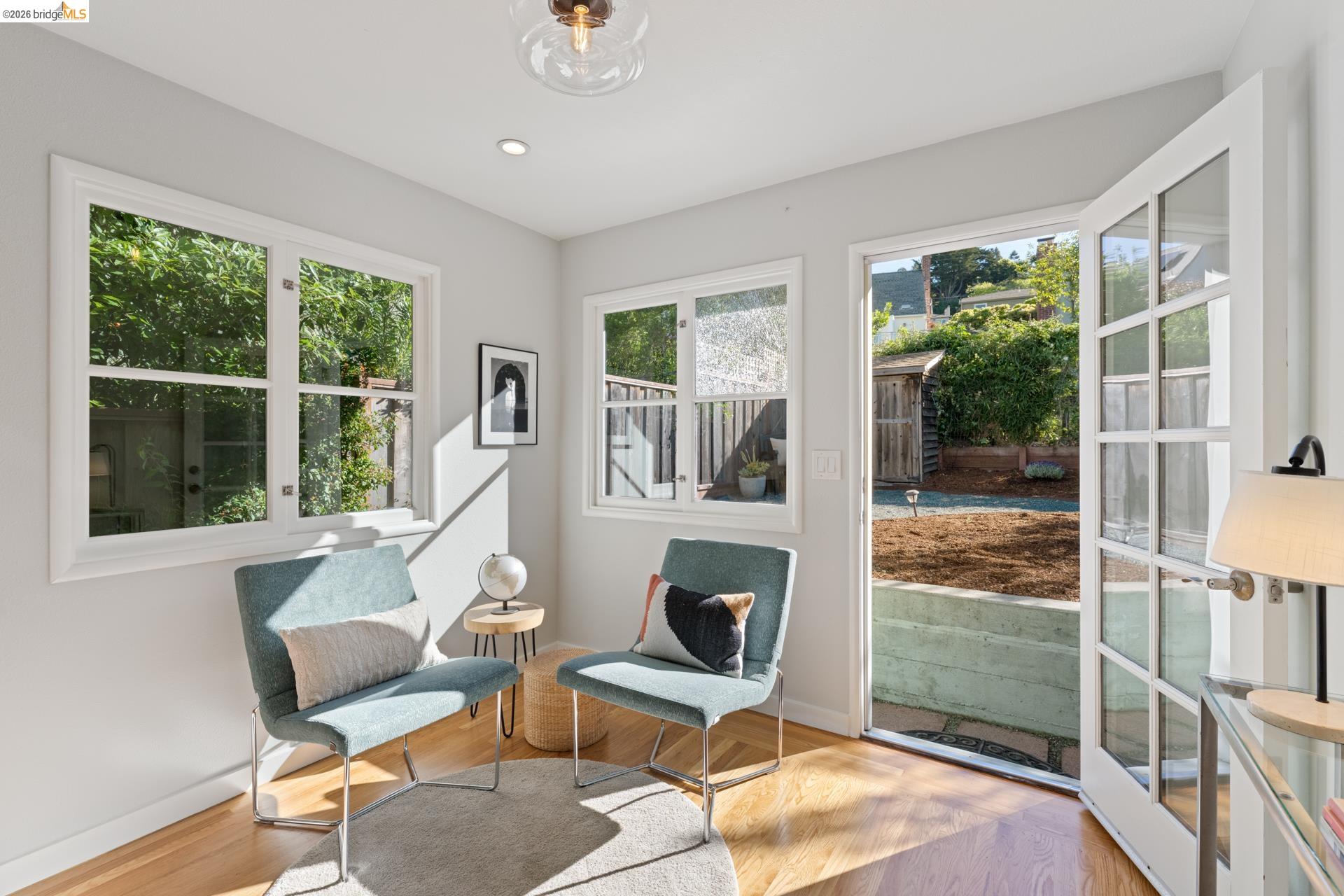 49 Windsor Avenue Kensington, CA 94708 - Photo 39 of 60 a view of a workspace with furniture and a window