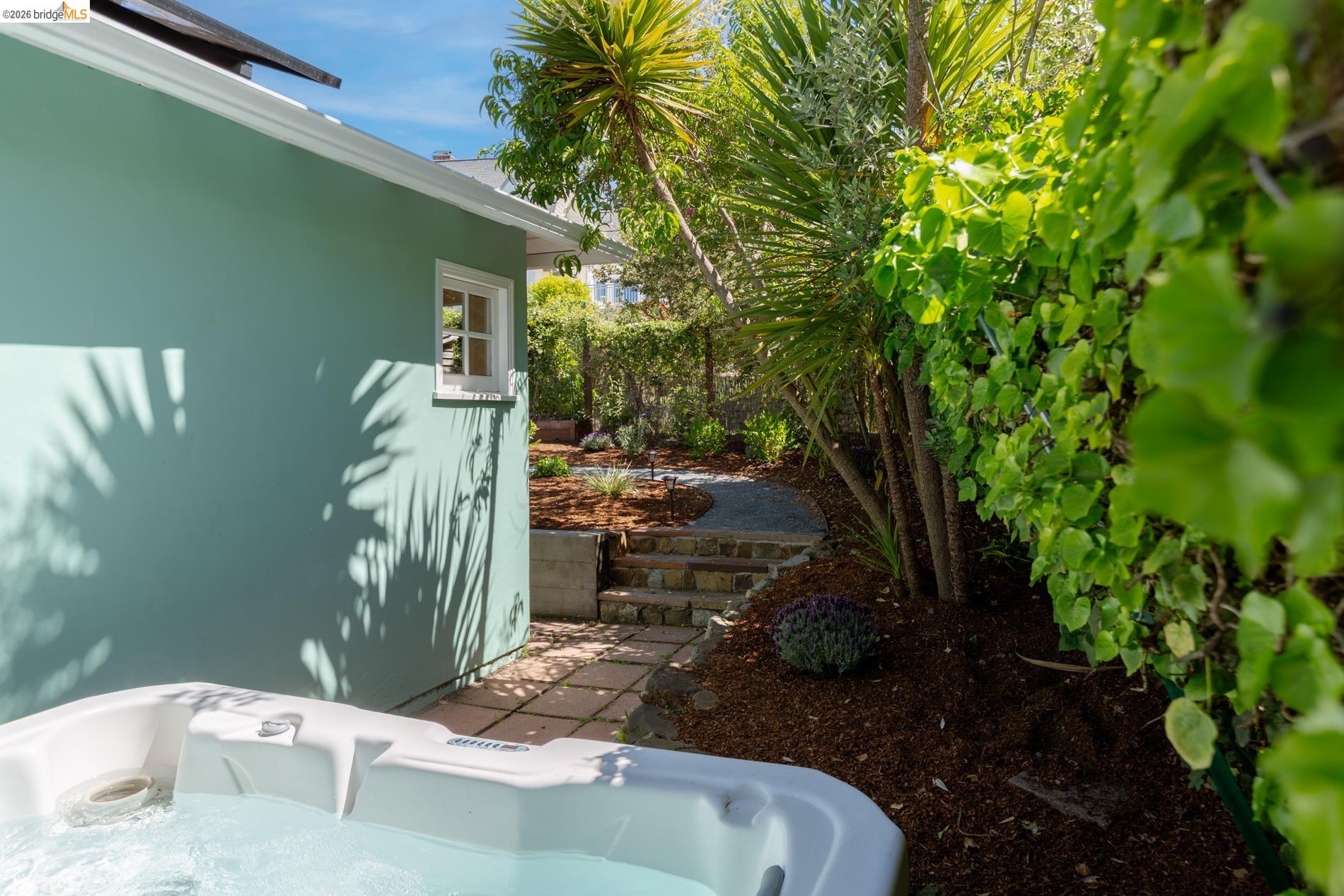 49 Windsor Avenue Kensington, CA 94708 - Photo 42 of 60 a backyard of a house with lots of green space