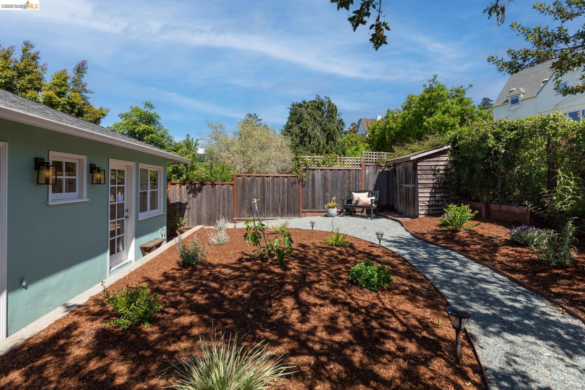49 Windsor Avenue Kensington, CA 94708 - Photo 46 of 60 a view of a backyard with a plants and a small yard