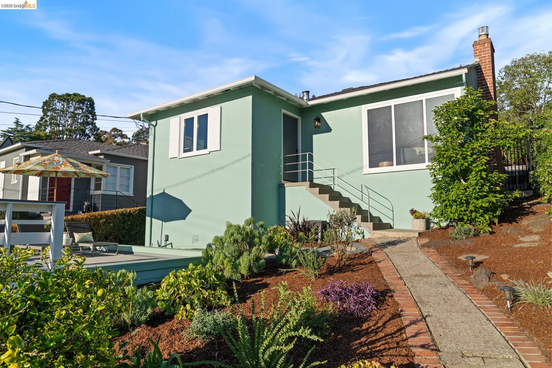49 Windsor Avenue Kensington, CA 94708 - Photo 49 of 60 a front view of a house with a yard