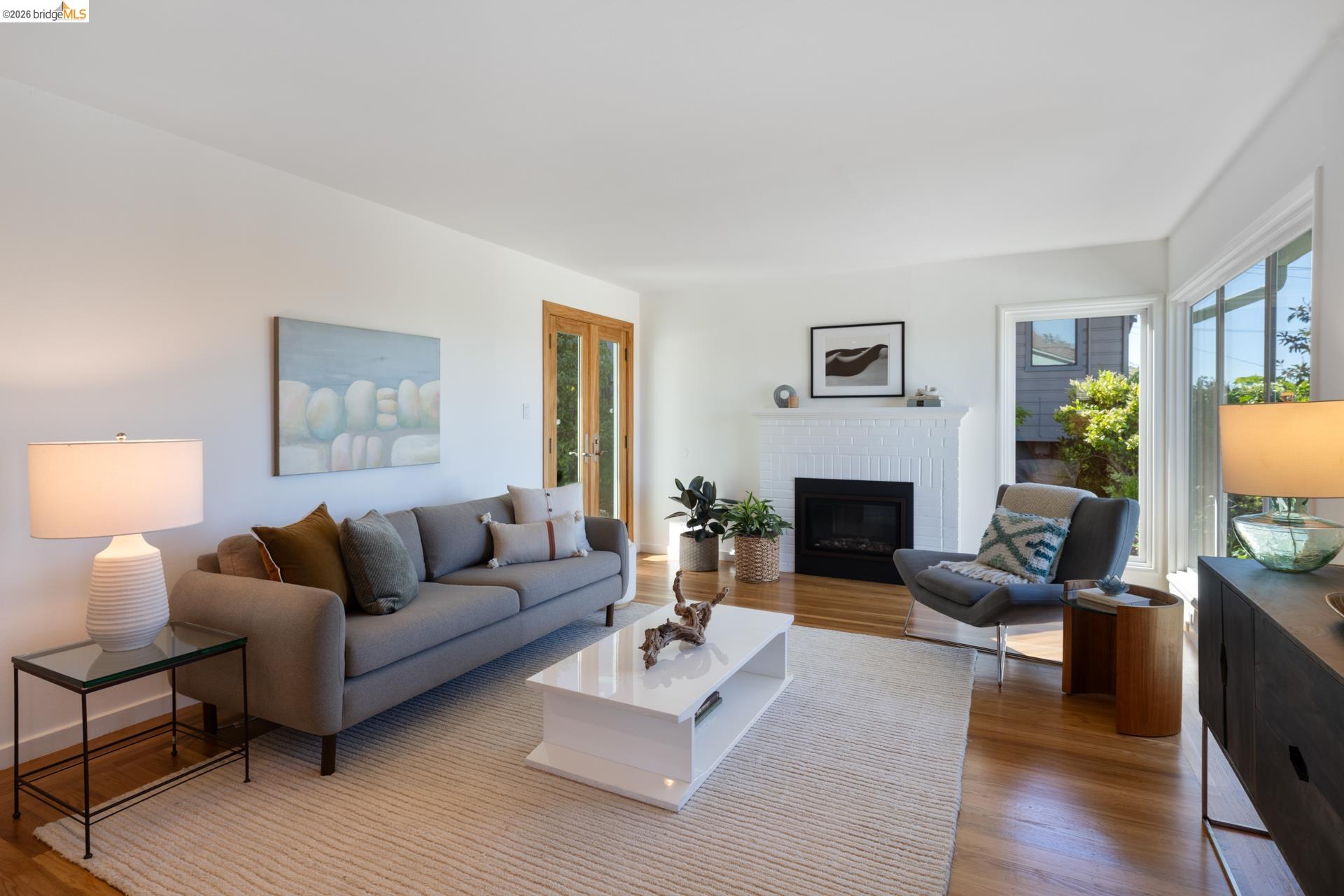 49 Windsor Avenue Kensington, CA 94708 - Photo 7 of 60 a living room with furniture a fireplace and a window