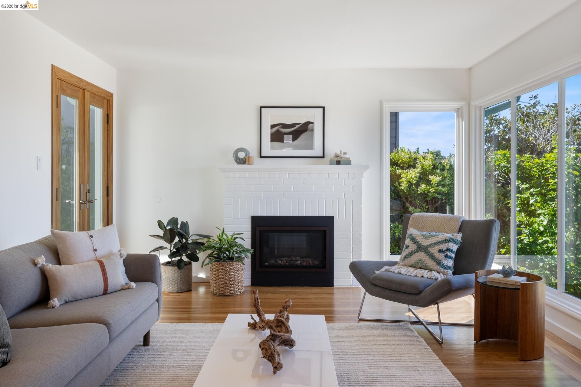 49 Windsor Avenue Kensington, CA 94708 - Photo 8 of 60 a living room with furniture and a fireplace