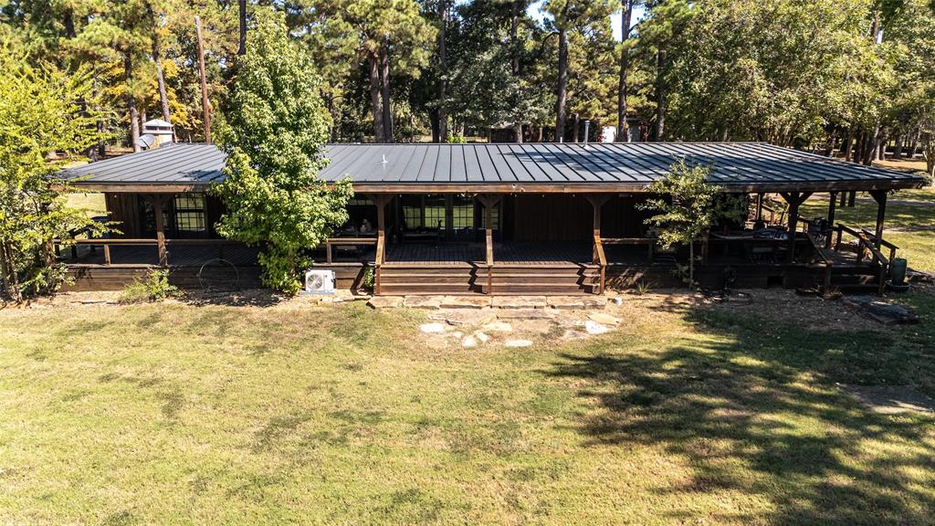 100 Letha Road Trinidad, TX 75163 - Photo 21 of 38 a backyard of a house with table and chairs