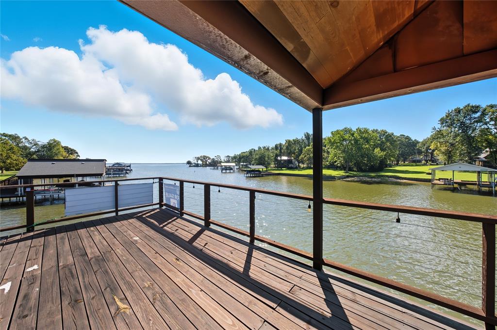 100 Letha Road Trinidad, TX 75163 - Photo 29 of 38 a view of a balcony with wooden floor